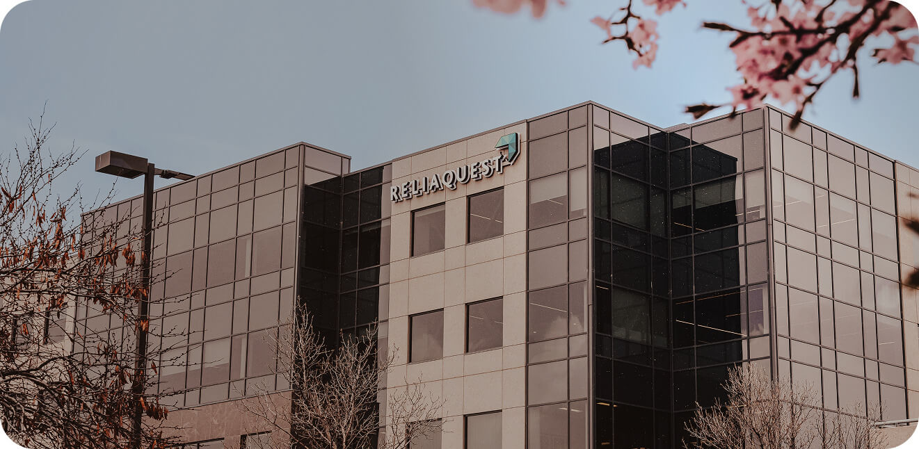 A commercial office building viewed from the street.